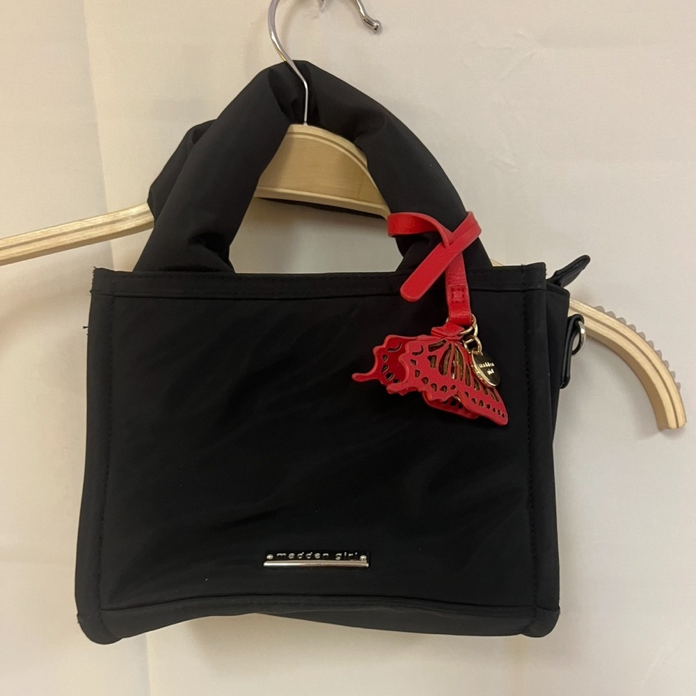 Madden girl black purse with red butterfly accent chain